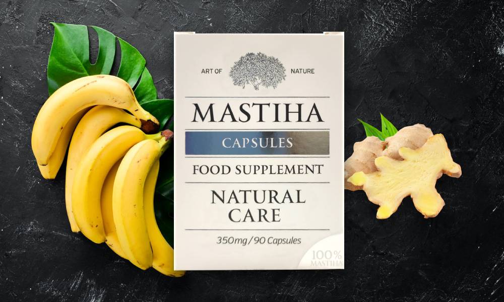 Na sliki je prikazana banana, ingver in na sredini velika škatla 100% Chios mastika kapsule.